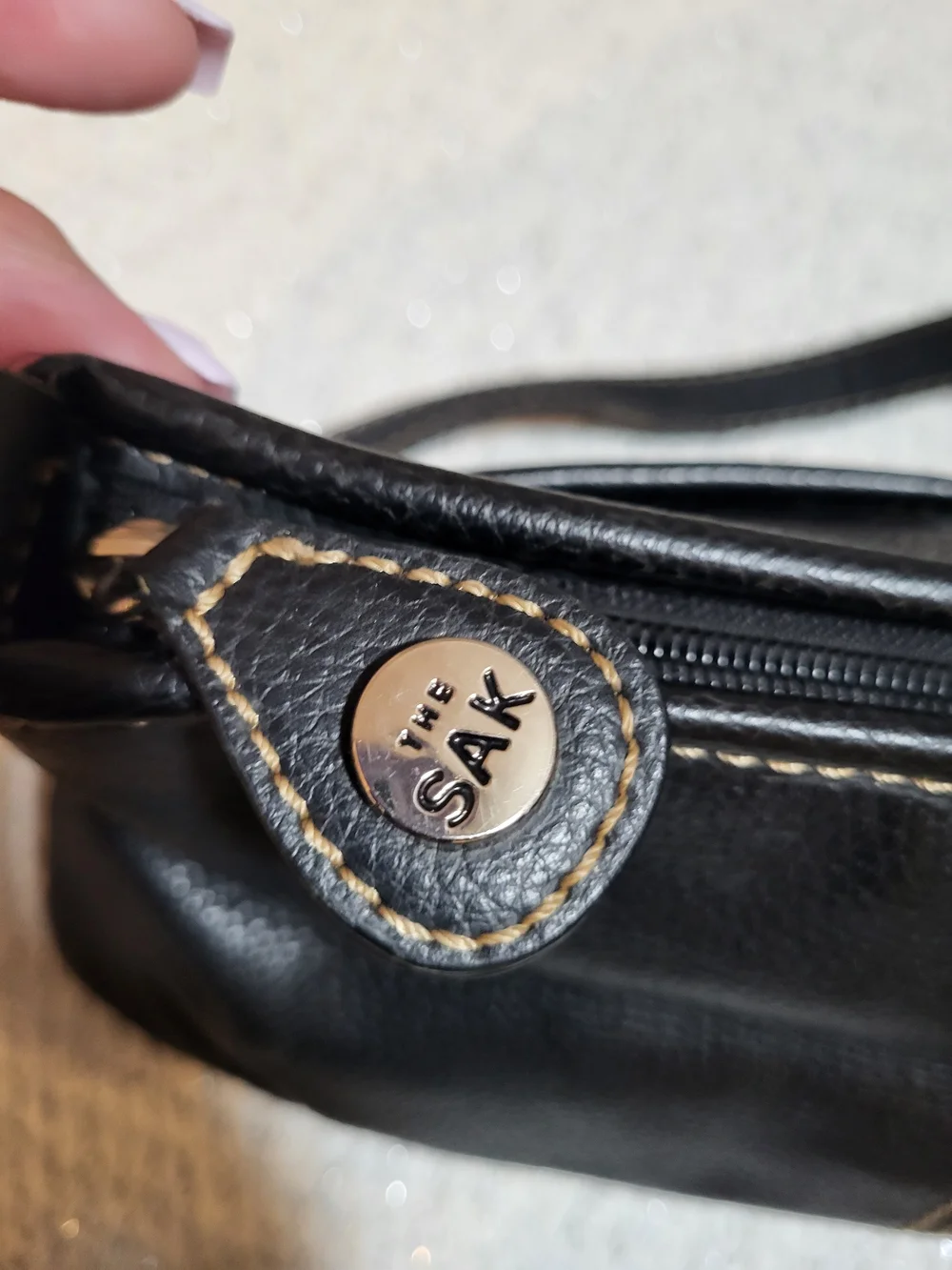 The Sak sleek black
